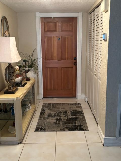 7531 Northwest 86th Terrace, Unit 101 Tamarac, FL 33321 - Photo 13 of 20 a kitchen with a stove