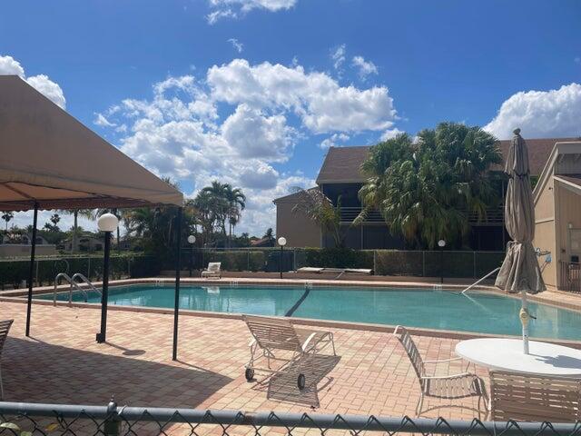7531 Northwest 86th Terrace, Unit 101 Tamarac, FL 33321 - Photo 3 of 20 a view of a backyard
