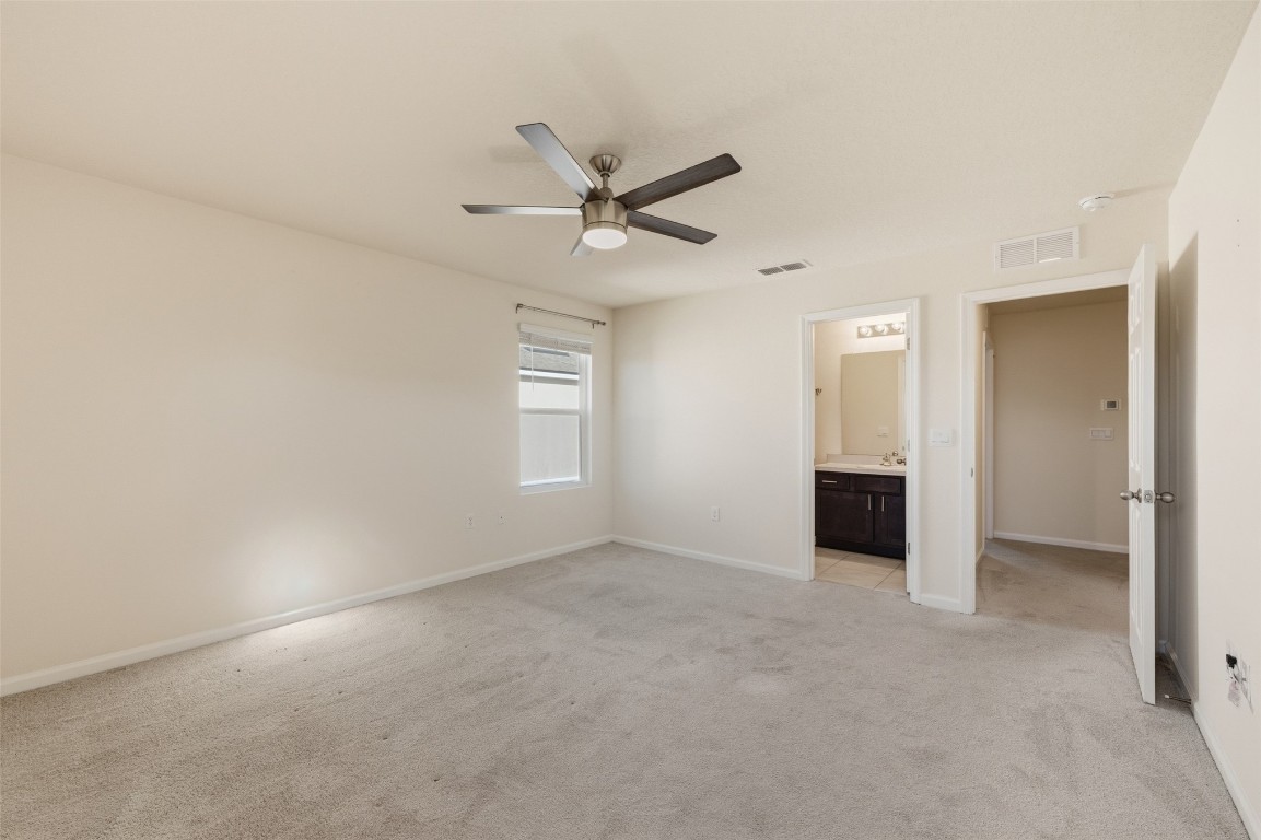908 Observatory Parkway Jacksonville, FL 32218 - Photo 14 of 16 an empty room with closet and windows