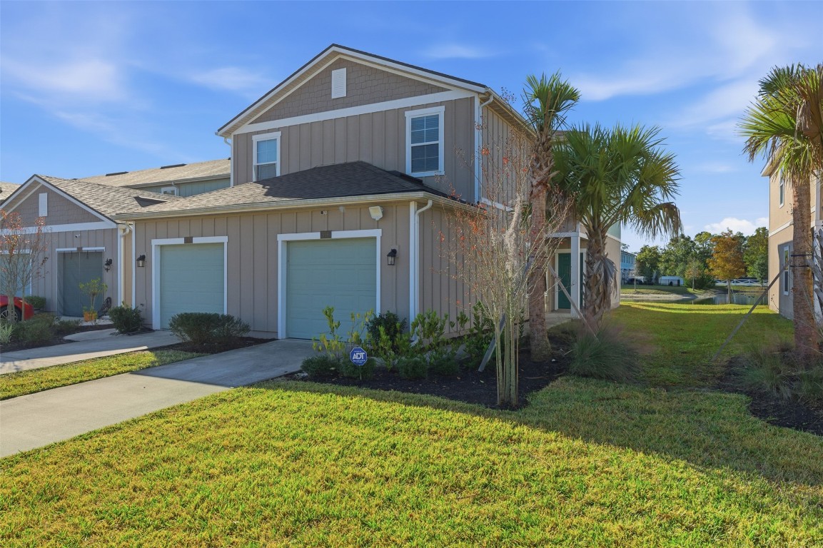 908 Observatory Parkway Jacksonville, FL 32218 - Photo 16 of 16 a front view of a house with garden
