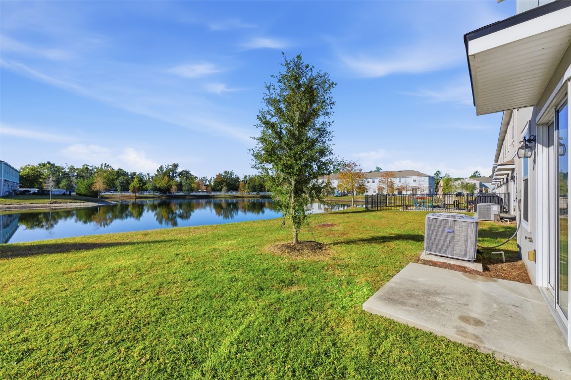 908 Observatory Parkway Jacksonville, FL 32218 - Photo 9 of 16 a view of a garden with lawn chairs