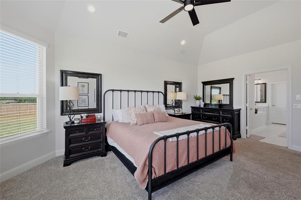 864 Shadow Valley Road Whitesboro, TX 76273 - Photo 22 of 40 Vaulted ceiling featuring a ceiling fan with integrated lighting and recessed lighting