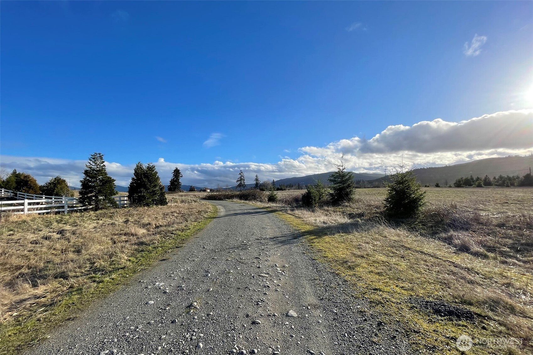 336 Bell Bottom Road Sequim, WA 98382 - Photo 8 of 29 a view of a dry yard with wooden fence