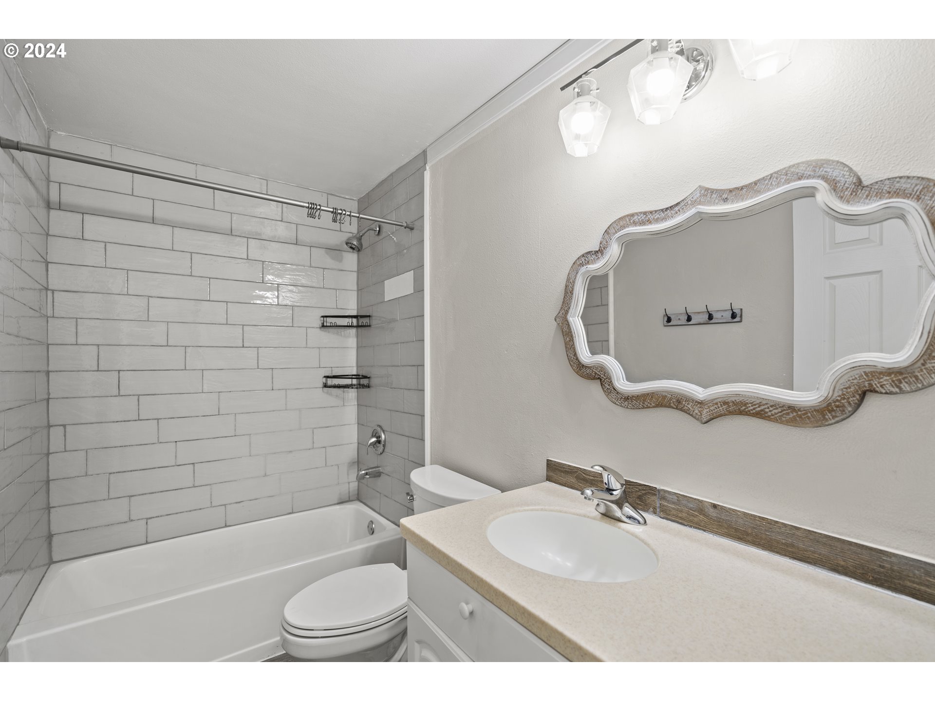 163 Christa Lane Eagle Point, OR 97524 - Photo 11 of 24 a bathroom with a sink a toilet and shower