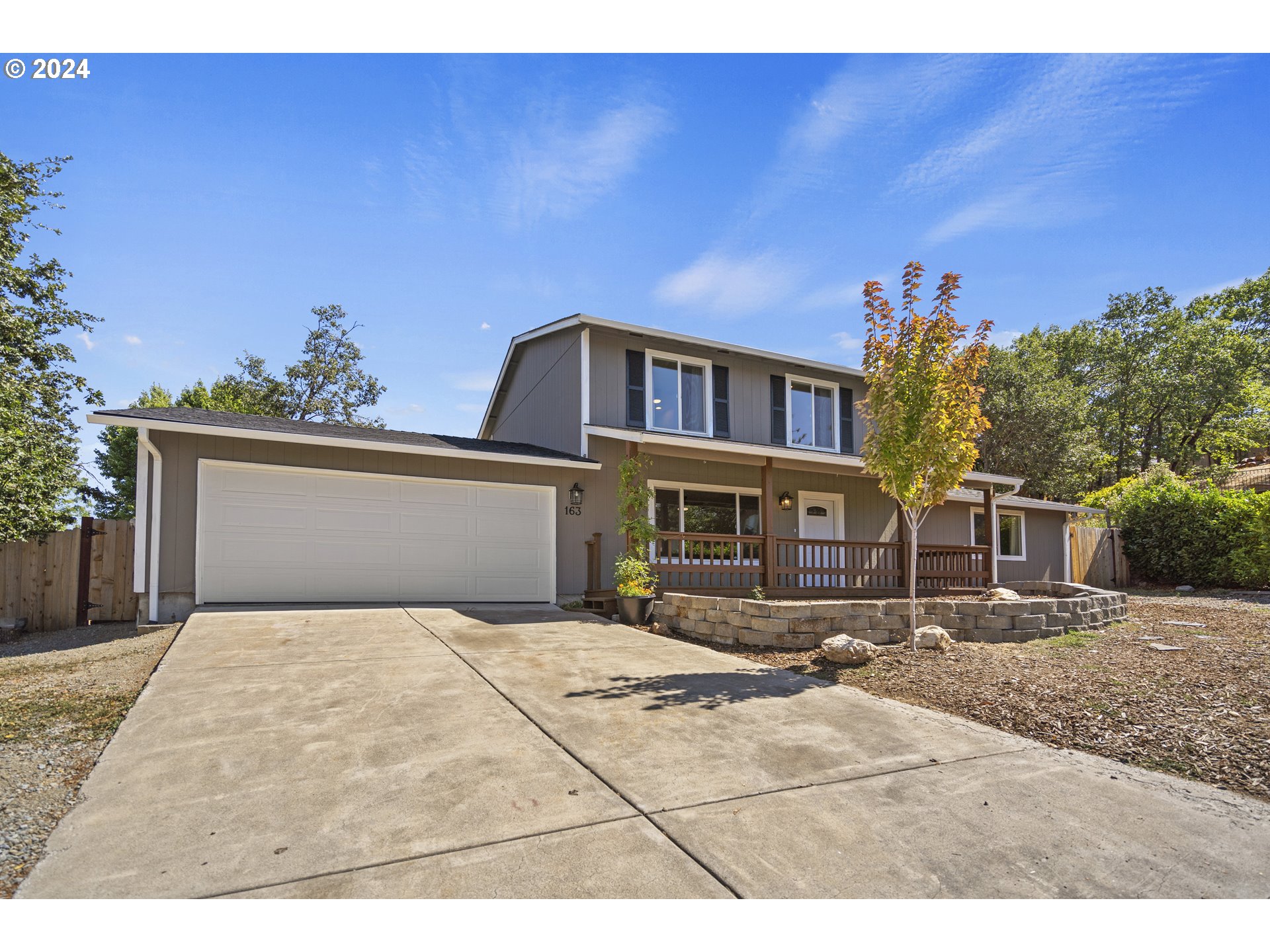 163 Christa Lane Eagle Point, OR 97524 - Photo 2 of 24 a house view with a outdoor space