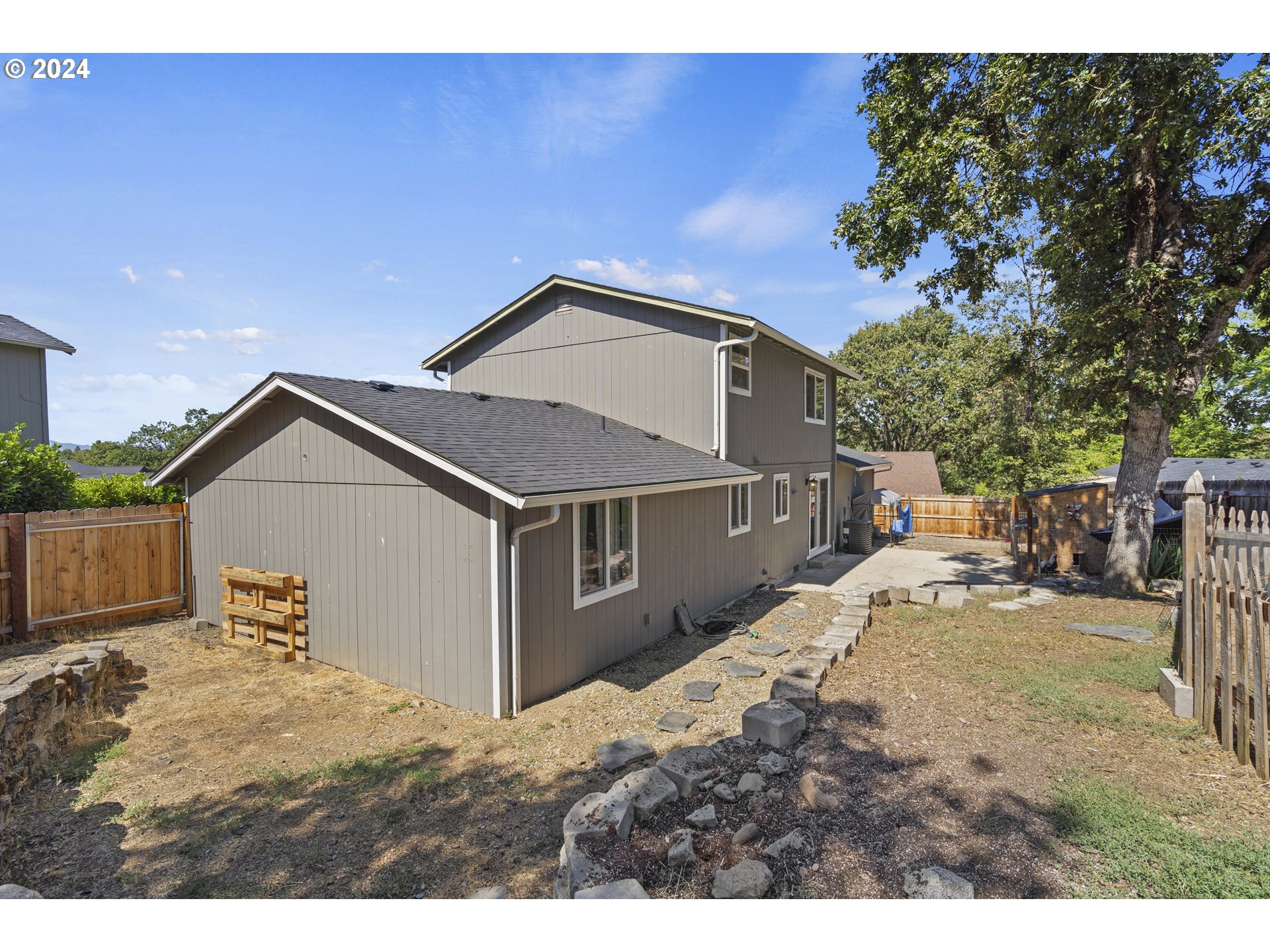 163 Christa Lane Eagle Point, OR 97524 - Photo 24 of 24 a view of a house with a yard