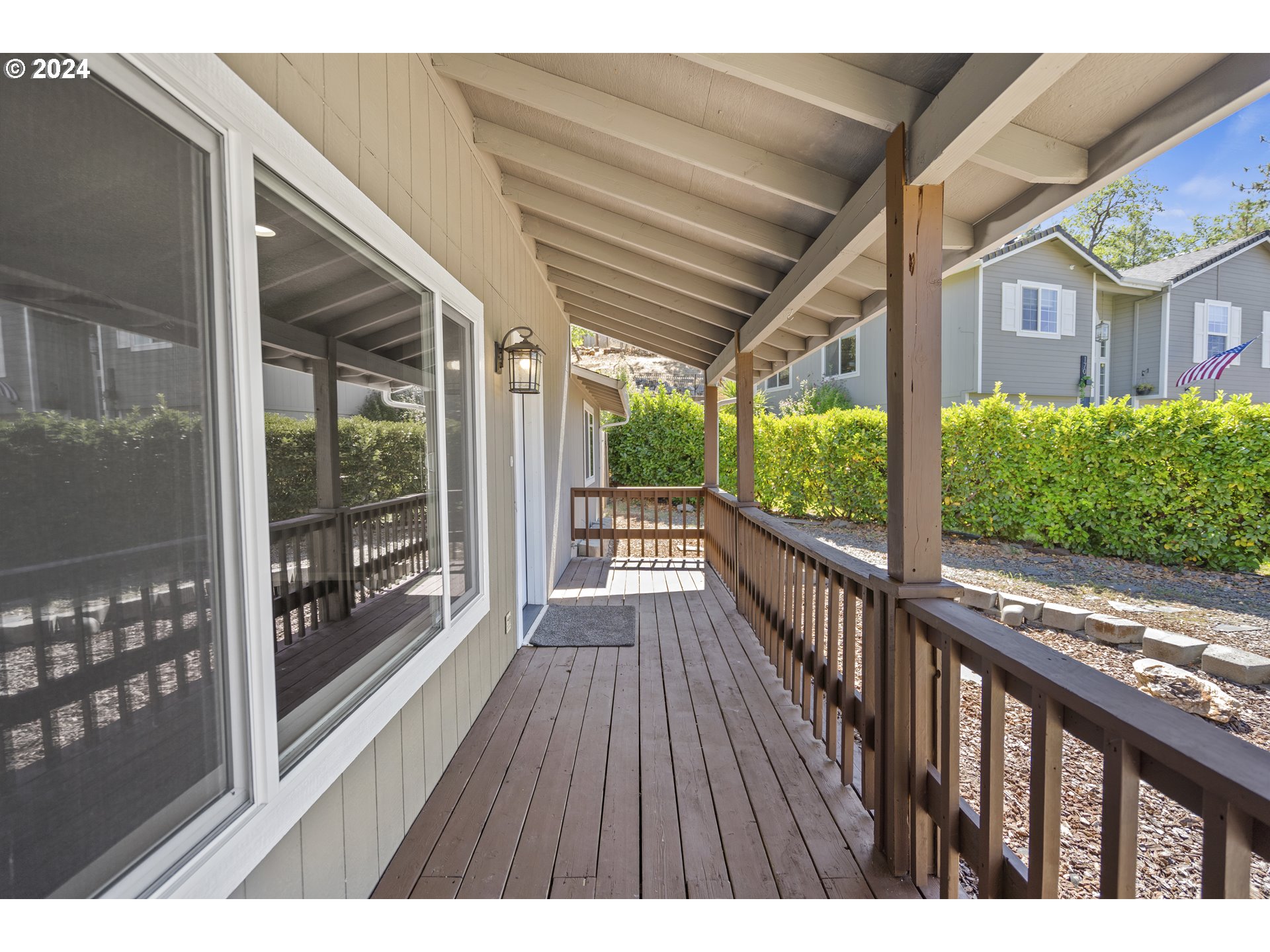 163 Christa Lane Eagle Point, OR 97524 - Photo 3 of 24 a view of balcony with wooden floor