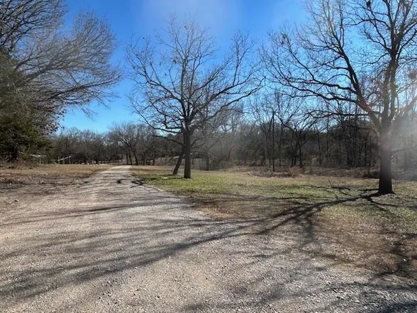$350,000 | 214 Whispering Oaks Street, Tom Bean, TX 75491