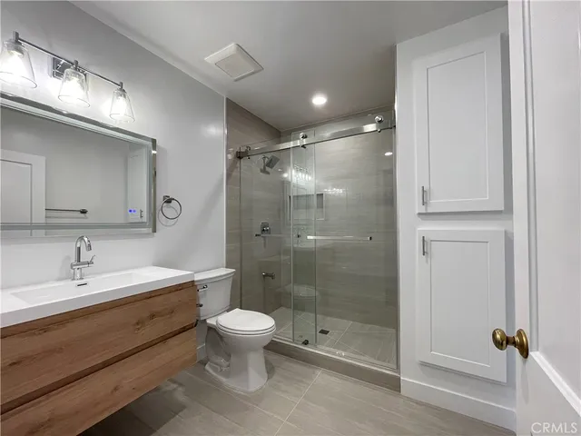 a view of a door and chair in the room