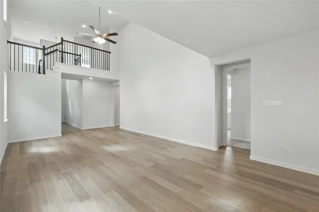 an empty room with wooden floor