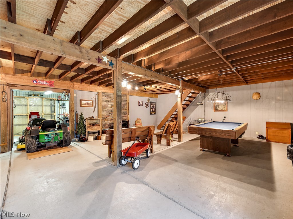 9650 Ruff Road West Salem, OH 44287 - Photo 29 of 35 Need more space for recreation? This finished & heated barn has you covered! It previously housed horses before the concrete floors were added. With the addition of some stalls and mats, this barn could easily be home to some more furry friends.