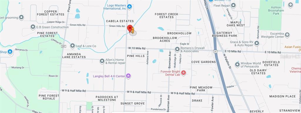 3200 Stefani Road Cantonment, FL 32533 - Photo 8 of 10 a picture of a book and a bed