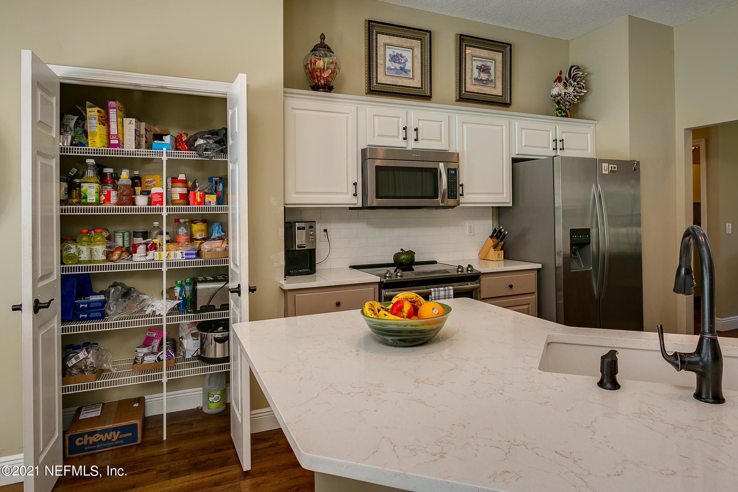 3124 Longleaf Ranch Circle Middleburg, FL 32068 - Photo 16 of 35 16-Pantry-Closet-Kitchen