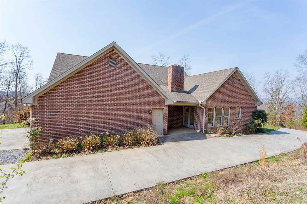 2683 Highway 30 Decatur, TN 37322 - Photo 2 of 47 front view of a house with a yard