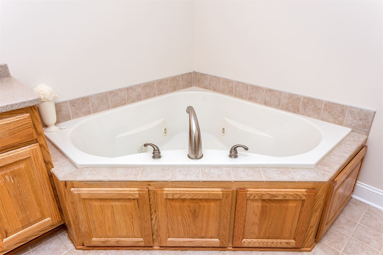 2683 Highway 30 Decatur, TN 37322 - Photo 26 of 47 a bathroom with a tub and a sink