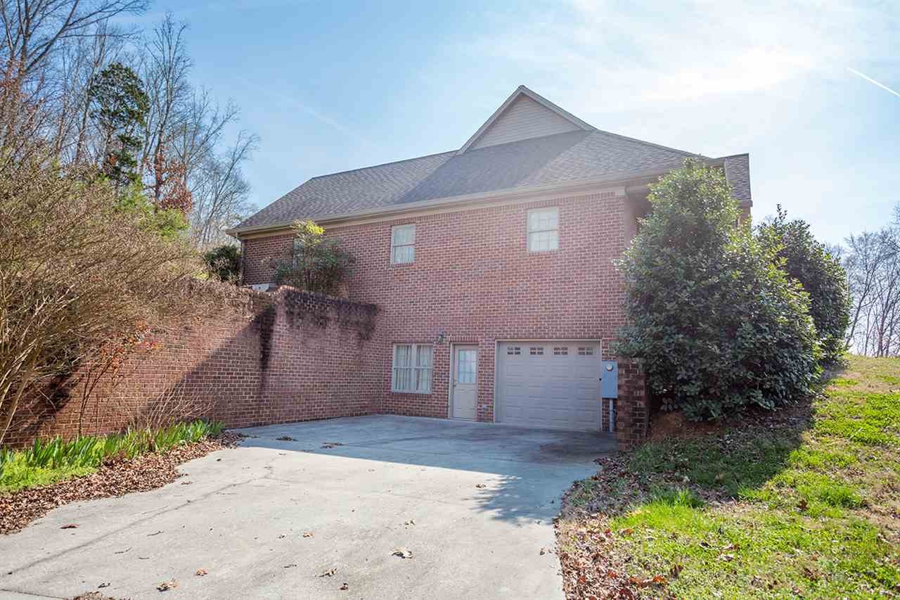 2683 Highway 30 Decatur, TN 37322 - Photo 3 of 47 a front view of a house with garden
