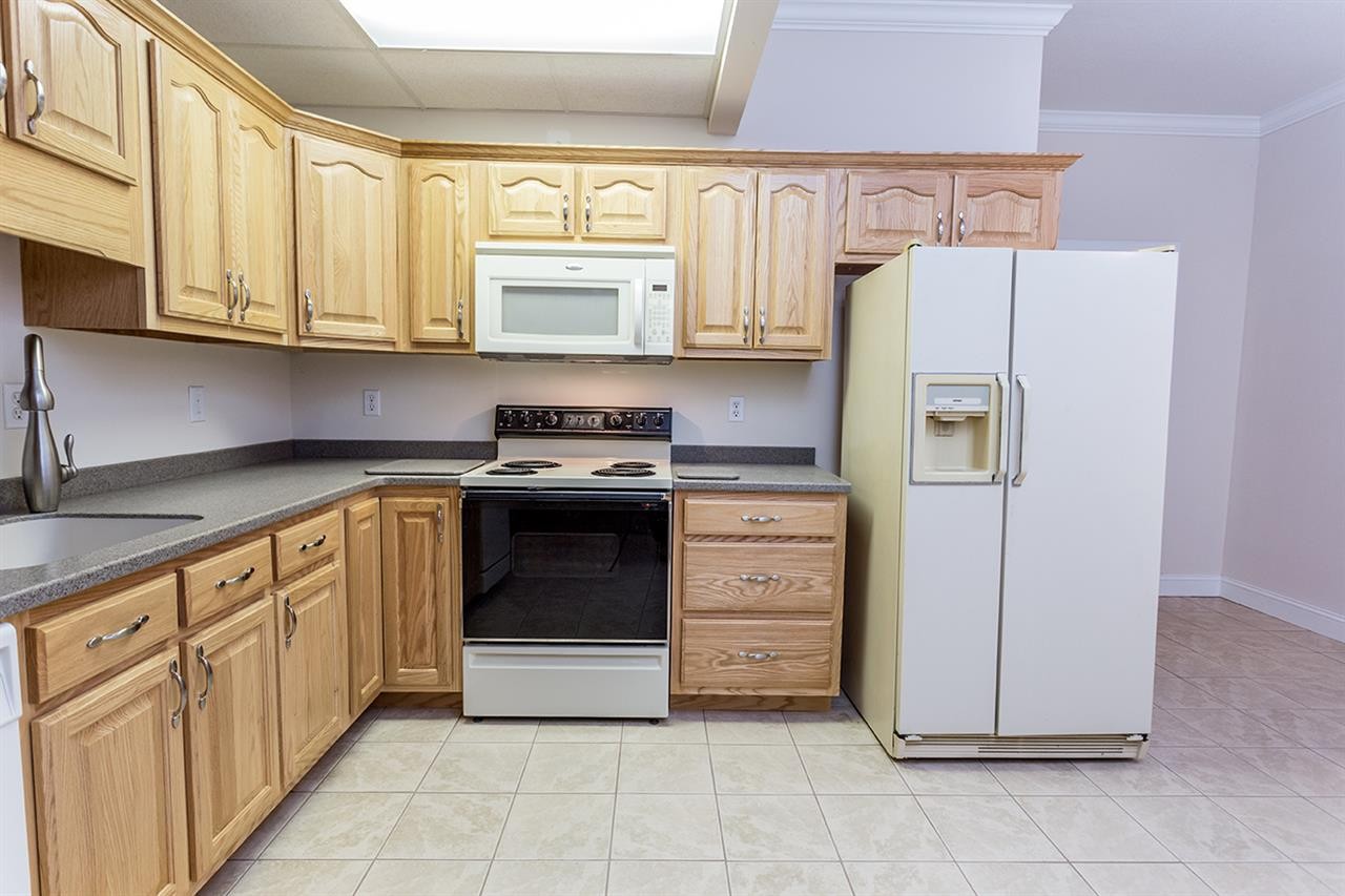 2683 Highway 30 Decatur, TN 37322 - Photo 38 of 47 a kitchen with stainless steel appliances granite countertop a refrigerator and a stove