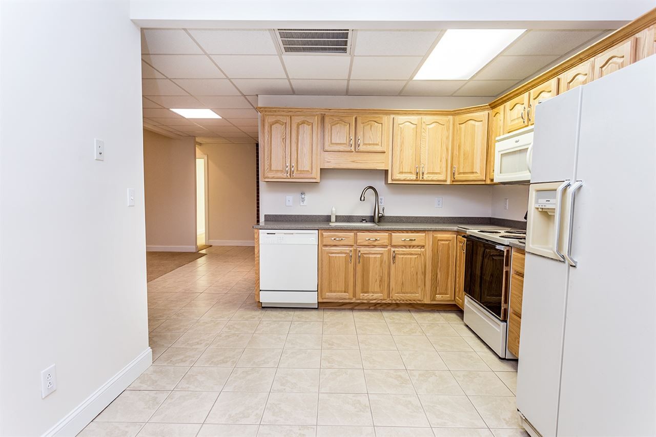 2683 Highway 30 Decatur, TN 37322 - Photo 39 of 47 a kitchen with a sink stove and cabinets