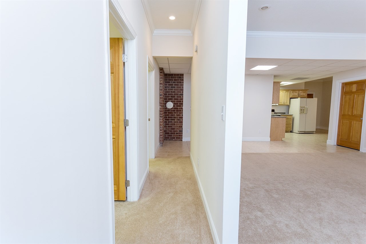 2683 Highway 30 Decatur, TN 37322 - Photo 42 of 47 a view of a hallway with wooden shelves