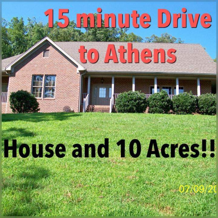 2683 Highway 30 Decatur, TN 37322 - Photo 47 of 47 a sign that is sitting in front of a brick house
