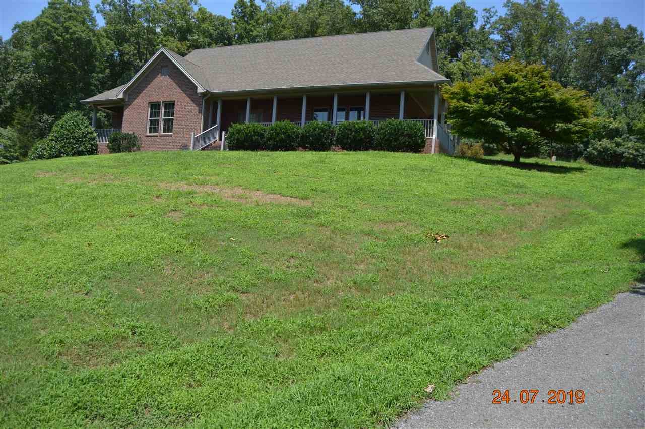 2683 Highway 30 Decatur, TN 37322 - Photo 6 of 47 a front of a house with a yard and trees