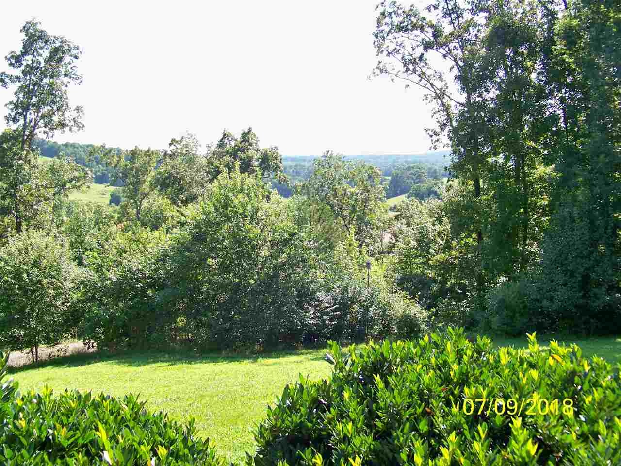2683 Highway 30 Decatur, TN 37322 - Photo 9 of 47 a view of a garden with a house