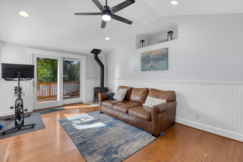 4 Rice Road Quincy, MA 02170 - Photo 15 of 26 a living room with furniture and a floor to ceiling window