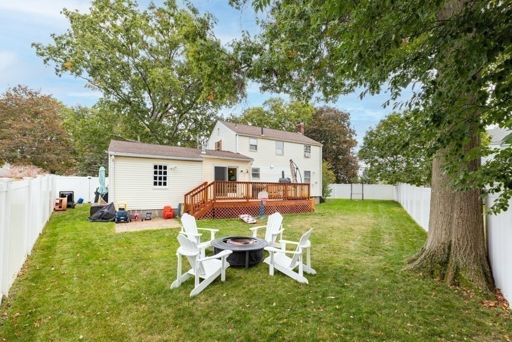 4 Rice Road Quincy, MA 02170 - Photo 24 of 26 a view of backyard of house with seating space