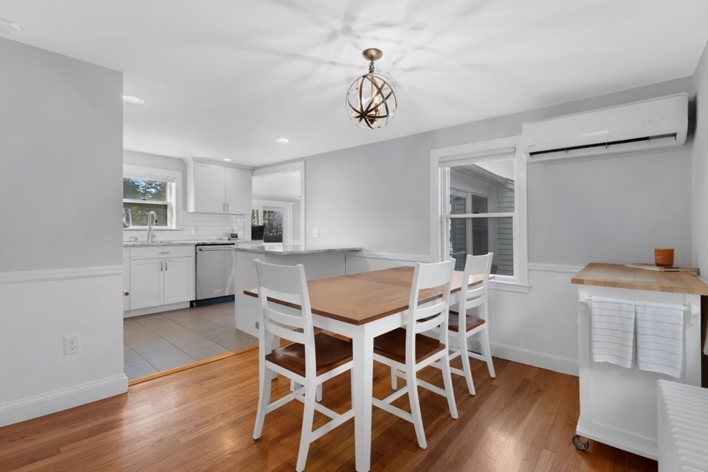 4 Rice Road Quincy, MA 02170 - Photo 8 of 26 a view of a dining room with furniture and wooden floor