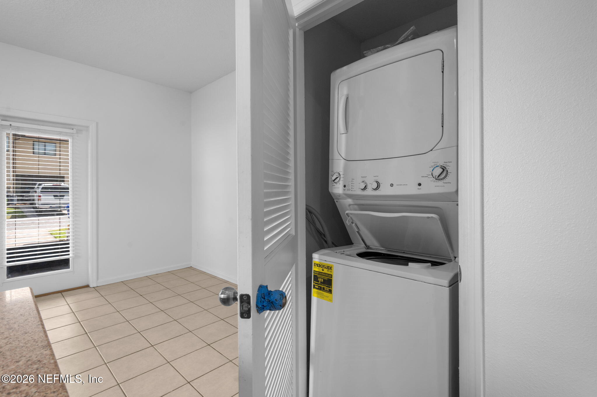 253 Syrah Way St. Augustine, FL 32084 - Photo 17 of 39 a utility room with dryer and washer