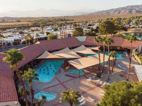 70200 Dillon Road, Unit 200 Desert Hot Springs, CA 92241 - Photo 28 of 31 an aerial view of residential houses with outdoor space