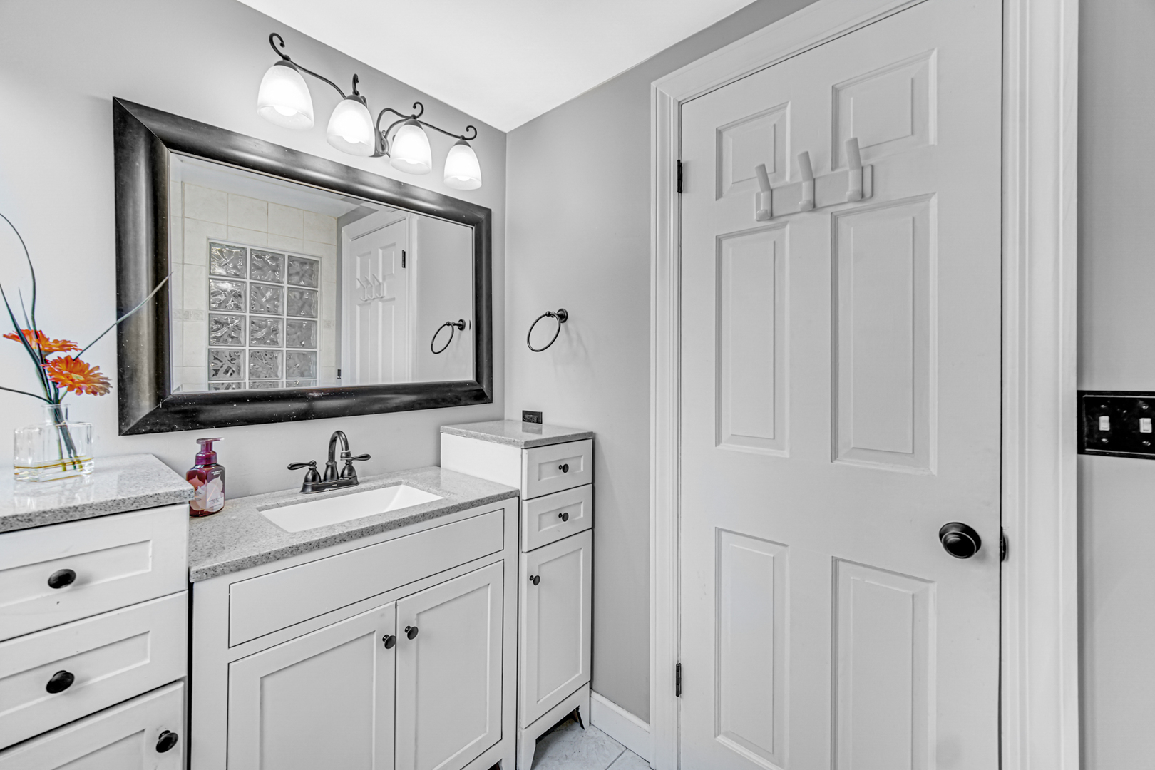 1910 Coventry Road New Lenox, IL 60451 - Photo 12 of 40 a bathroom with double vanity sink and a mirror