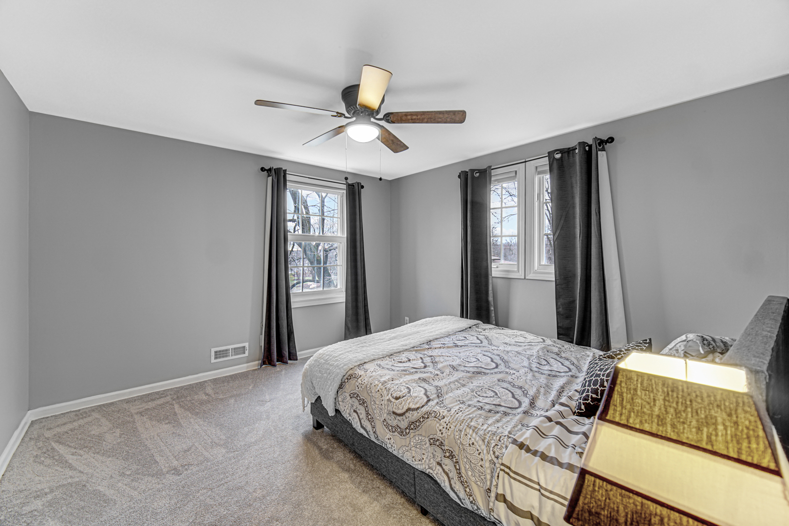 1910 Coventry Road New Lenox, IL 60451 - Photo 14 of 40 a bedroom with a large bed and a window