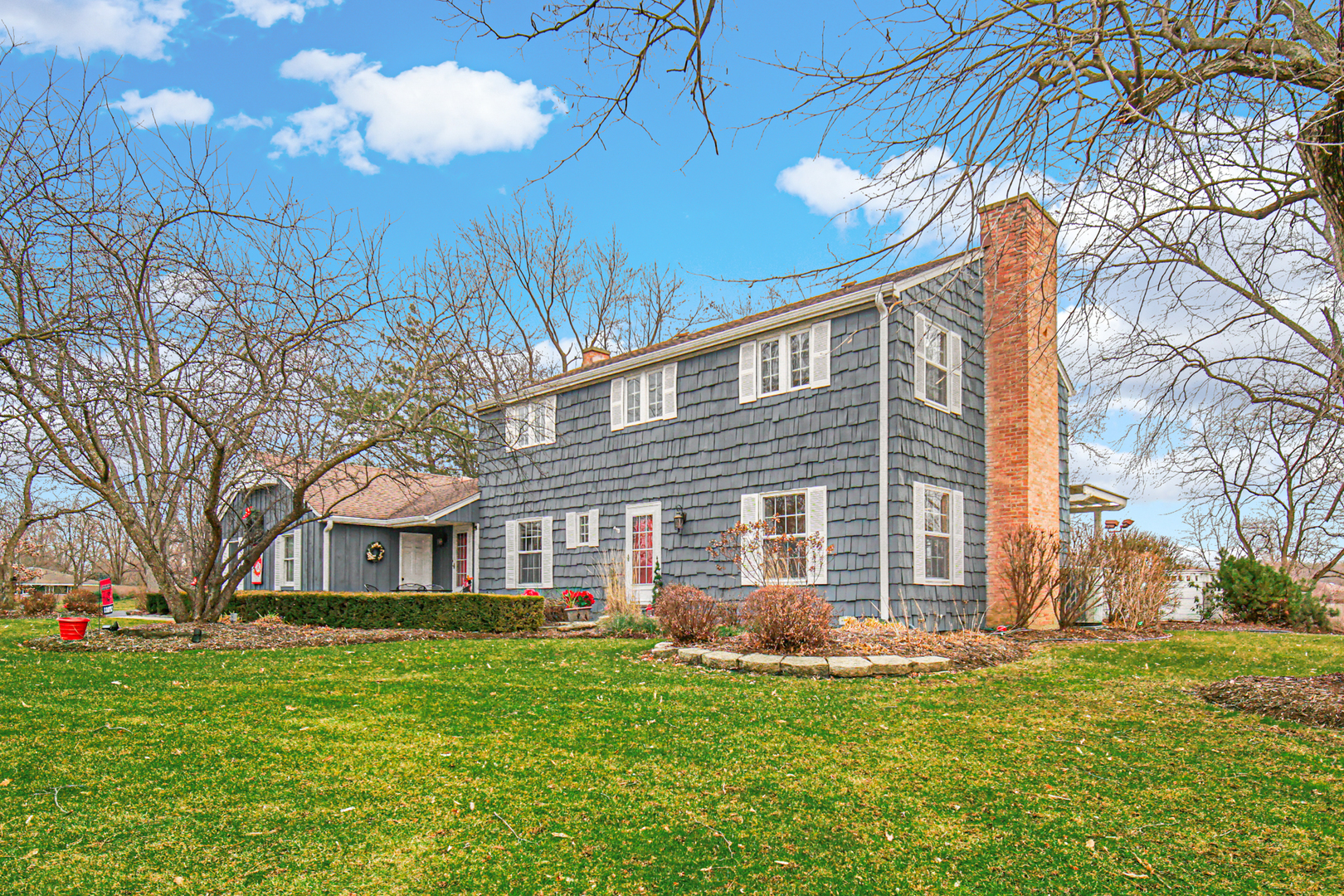 1910 Coventry Road New Lenox, IL 60451 - Photo 24 of 40 a front view of a house with a yard