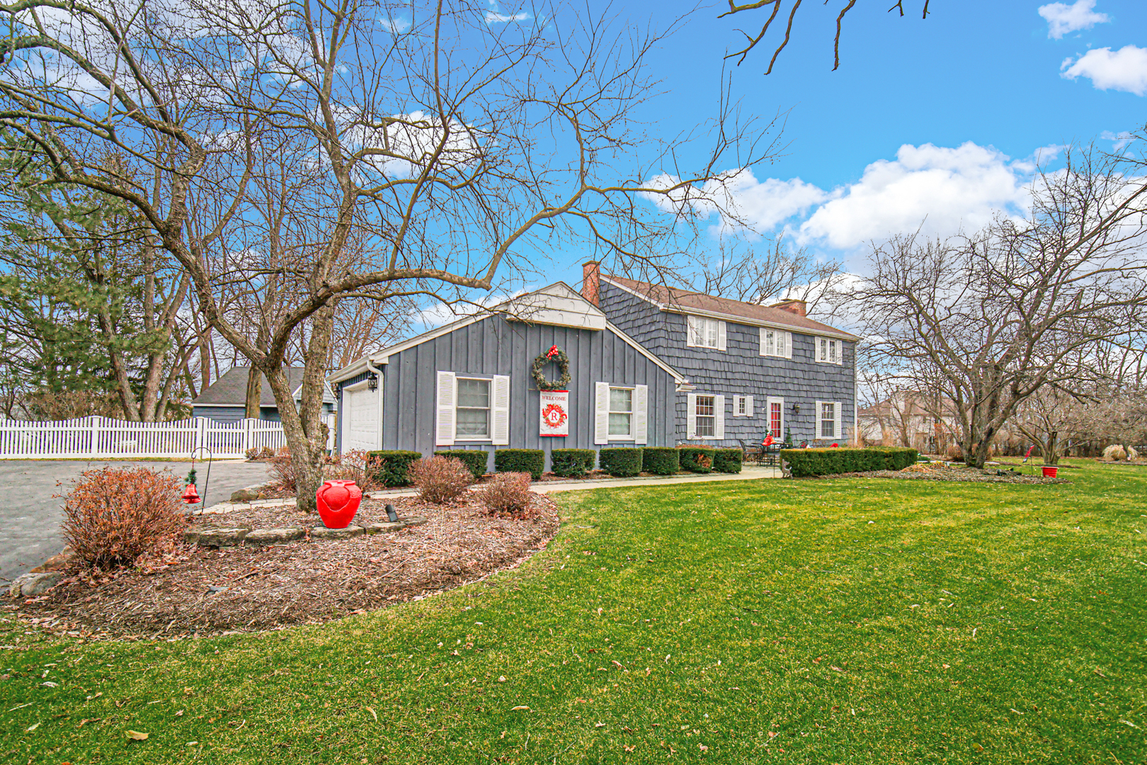 1910 Coventry Road New Lenox, IL 60451 - Photo 25 of 40 a front view of house with yard and trees around