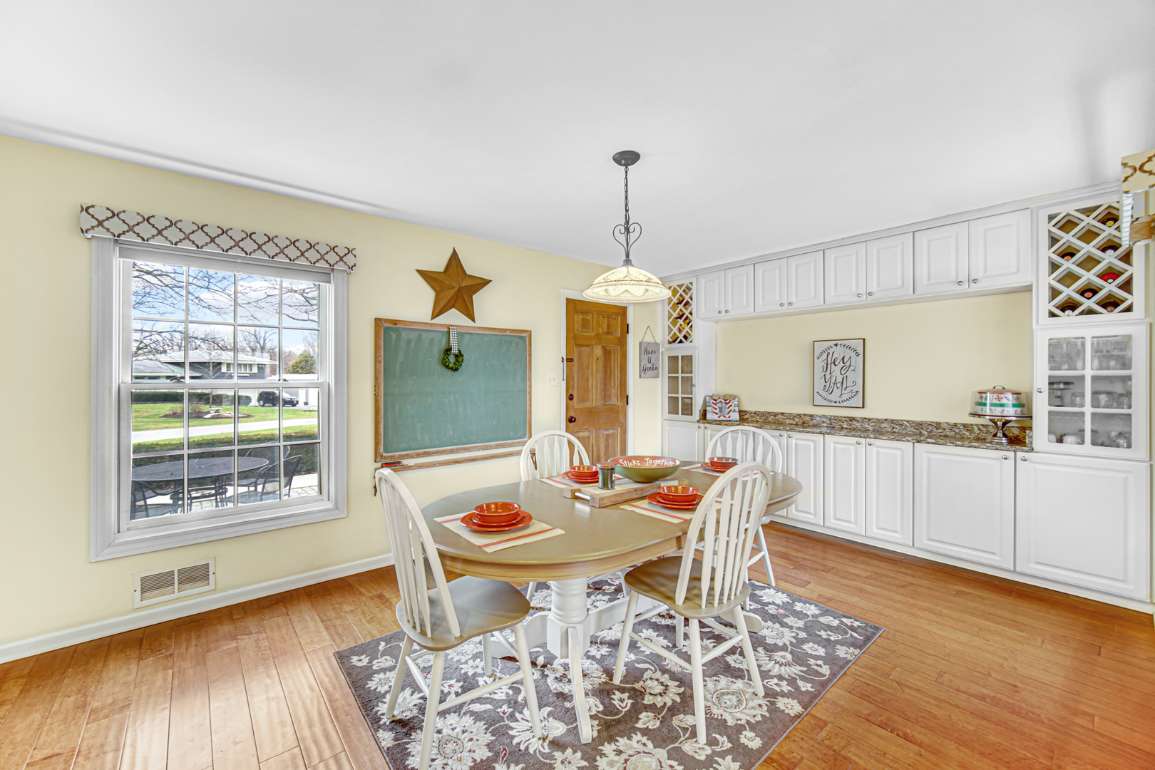 1910 Coventry Road New Lenox, IL 60451 - Photo 4 of 40 a dining room with furniture and wooden floor