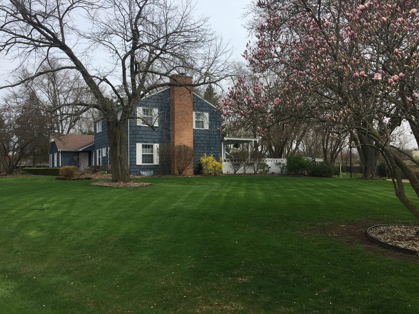1910 Coventry Road New Lenox, IL 60451 - Photo 33 of 40 a view of a house with a yard porch and sitting area