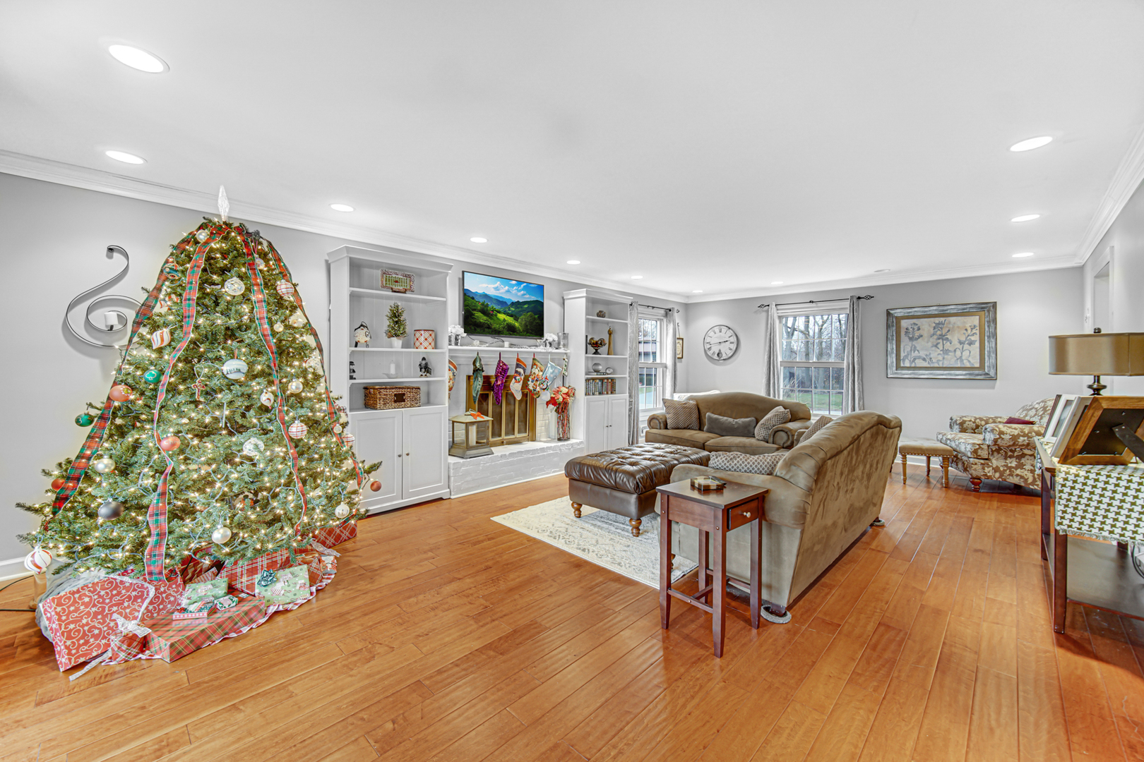 1910 Coventry Road New Lenox, IL 60451 - Photo 8 of 40 a living room with furniture and a flat screen tv