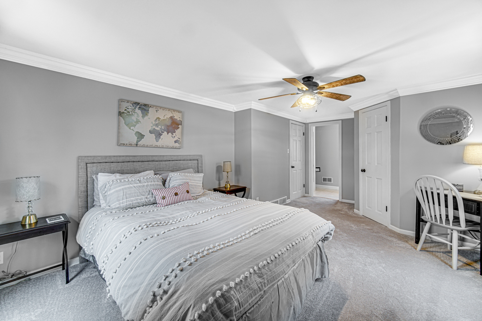 1910 Coventry Road New Lenox, IL 60451 - Photo 10 of 40 a bedroom with a bed and a chandelier