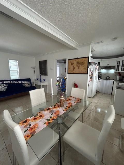1101 Southwest 17th Avenue Miami, FL 33135 - Photo 11 of 27 a living room with furniture and a flat screen tv