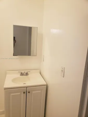 a bathroom with a toilet and a sink