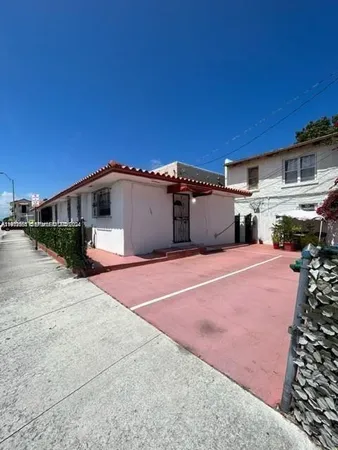 a view of a house with a patio