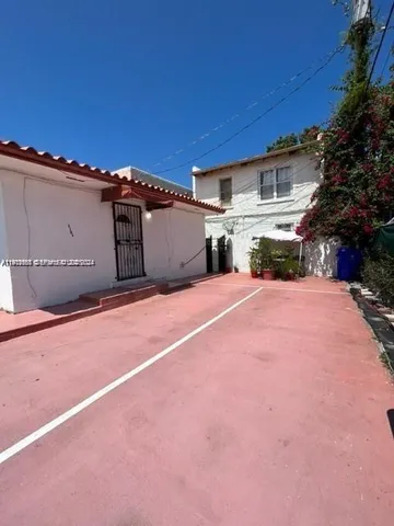 a view of a house with a big yard