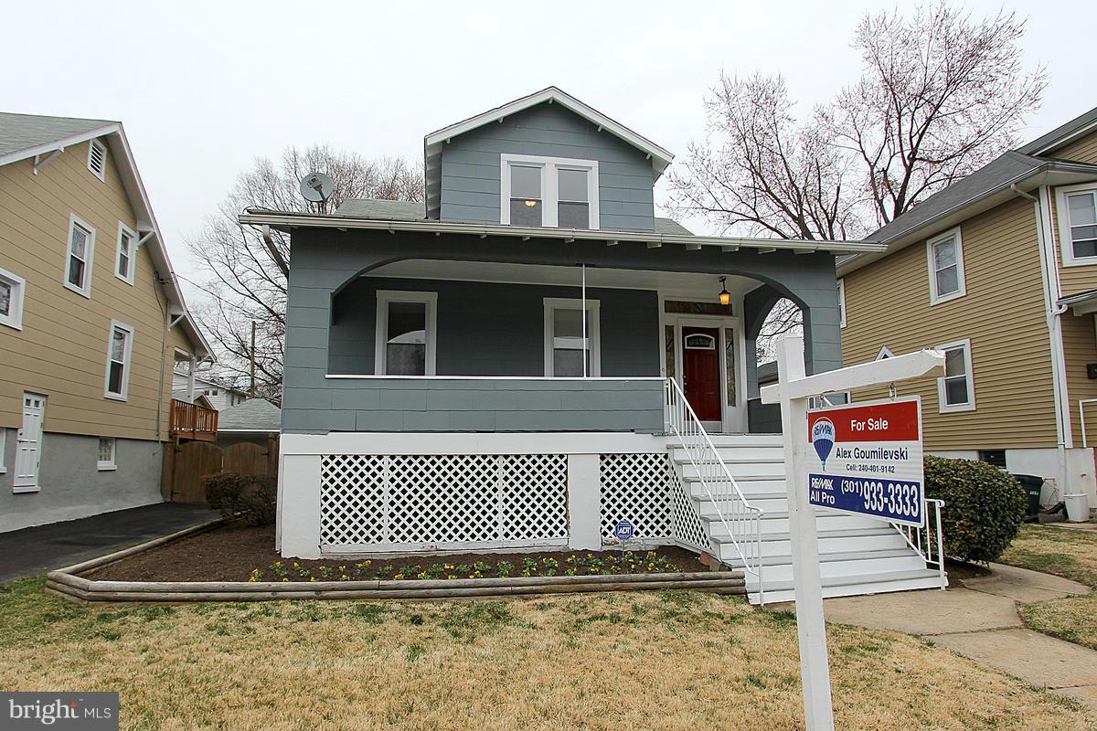 a front view of a house with a garage