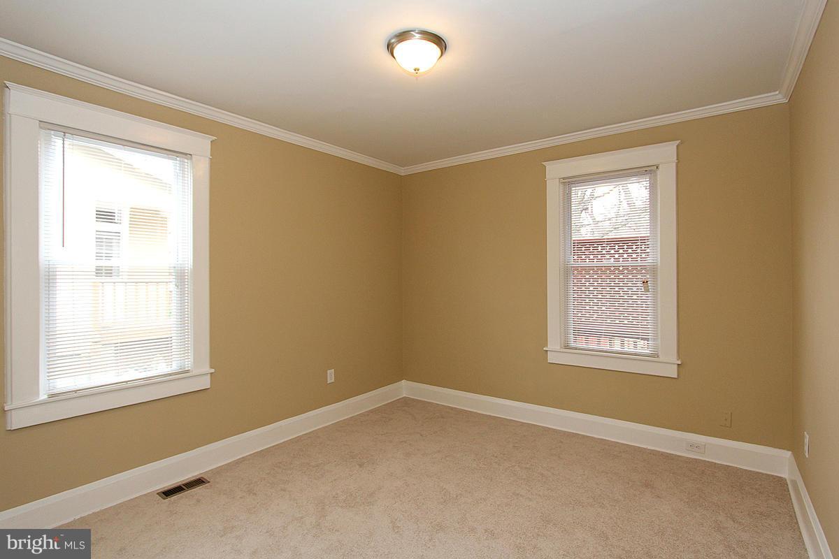 3106 Rueckert Avenue Baltimore, MD 21214 - Photo 14 of 29 a view of an empty room with a window