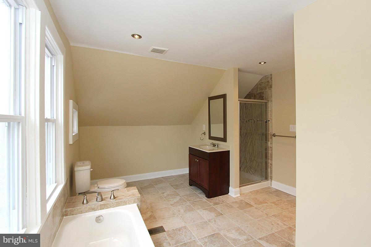 3106 Rueckert Avenue Baltimore, MD 21214 - Photo 23 of 29 a view of a hallway with bathroom