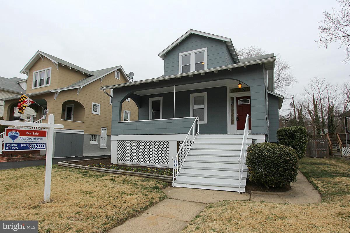 3106 Rueckert Avenue Baltimore, MD 21214 - Photo 29 of 29 a view of a house with a yard and garage