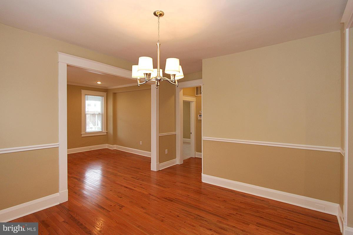 3106 Rueckert Avenue Baltimore, MD 21214 - Photo 7 of 29 a view of livingroom with hardwood floor and window