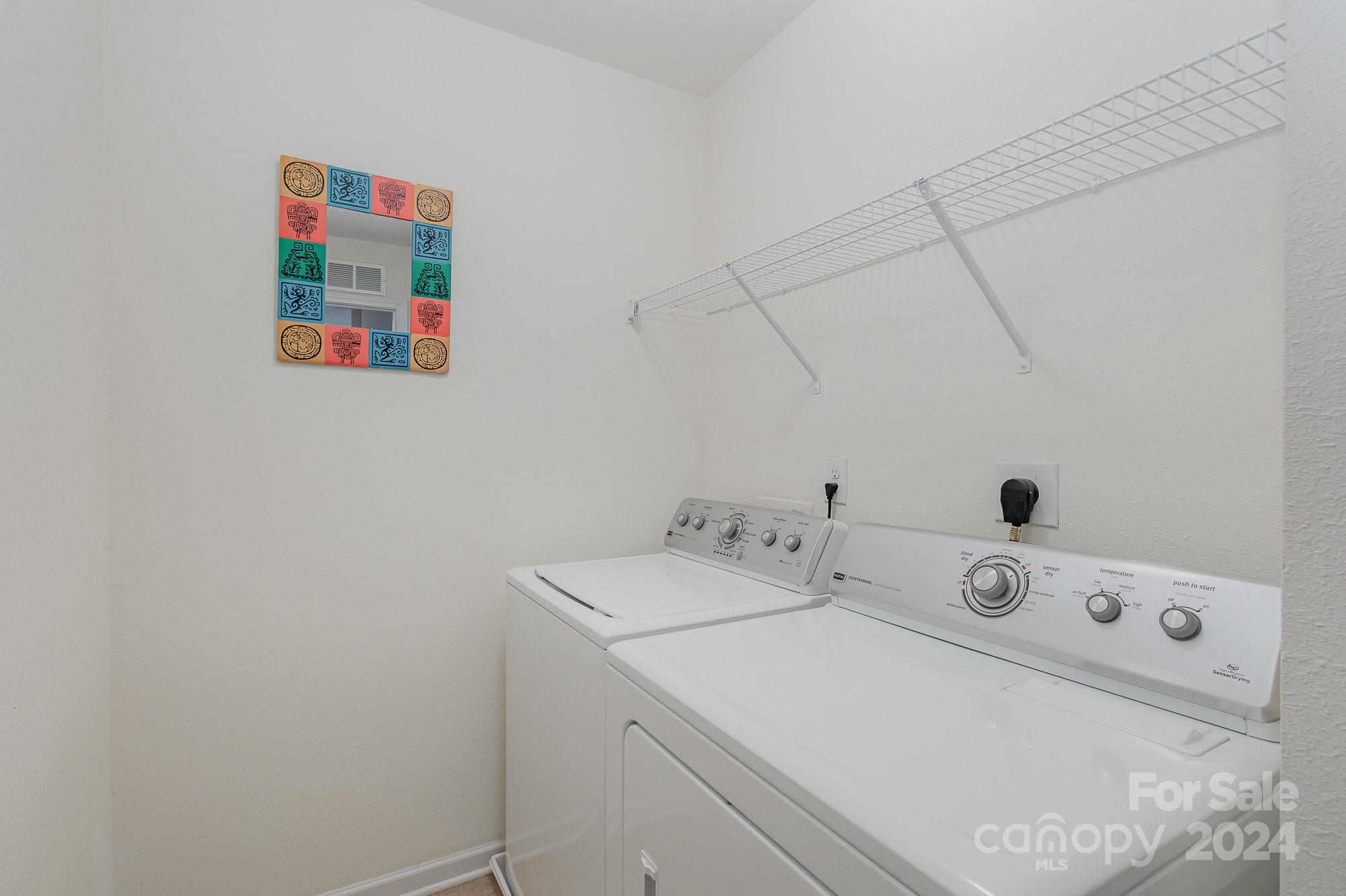 714 Waterlemon Way Monroe, NC 28110 - Photo 32 of 38 a utility room with dryer and washer