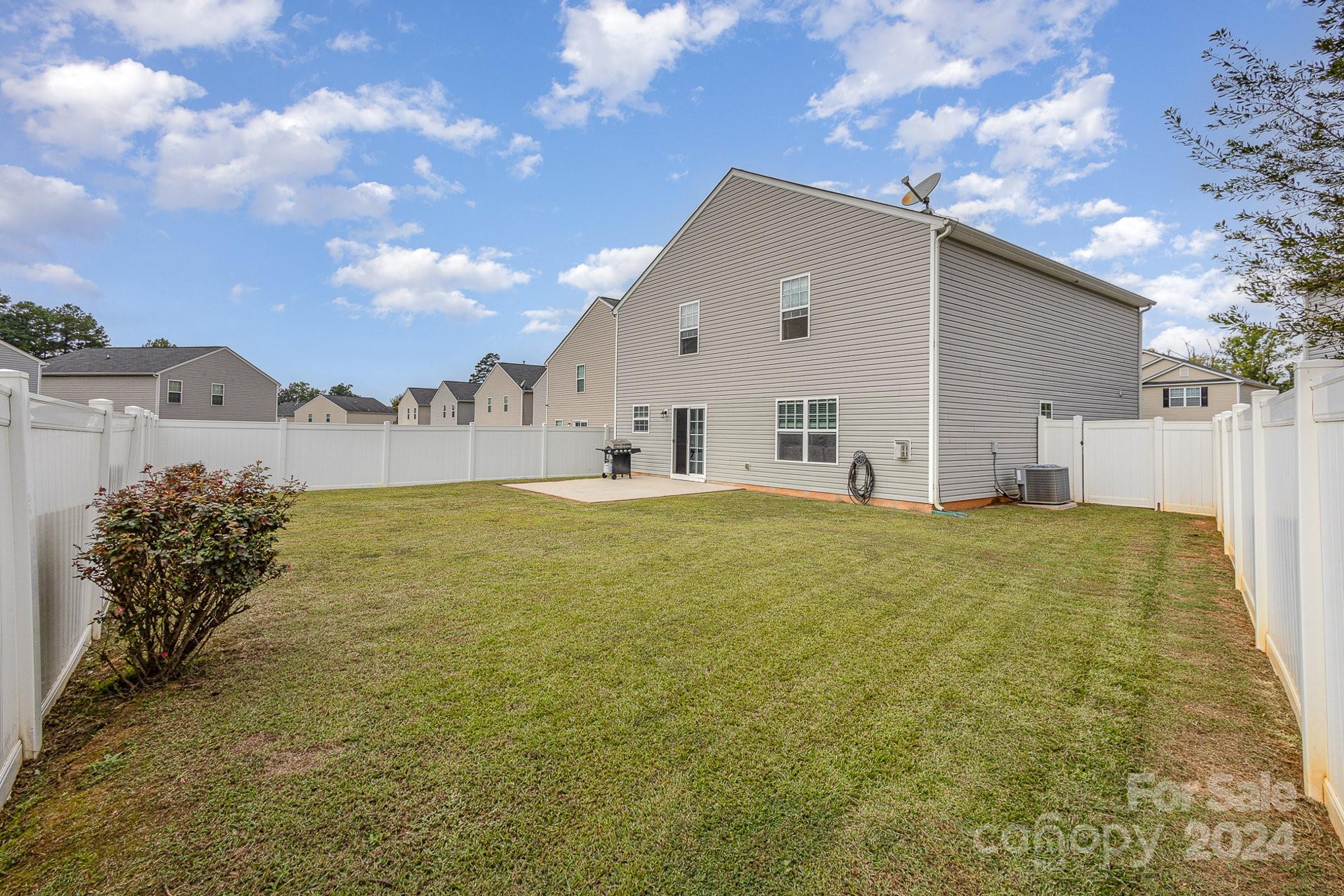 714 Waterlemon Way Monroe, NC 28110 - Photo 36 of 38 a house view with swimming pool in front of it